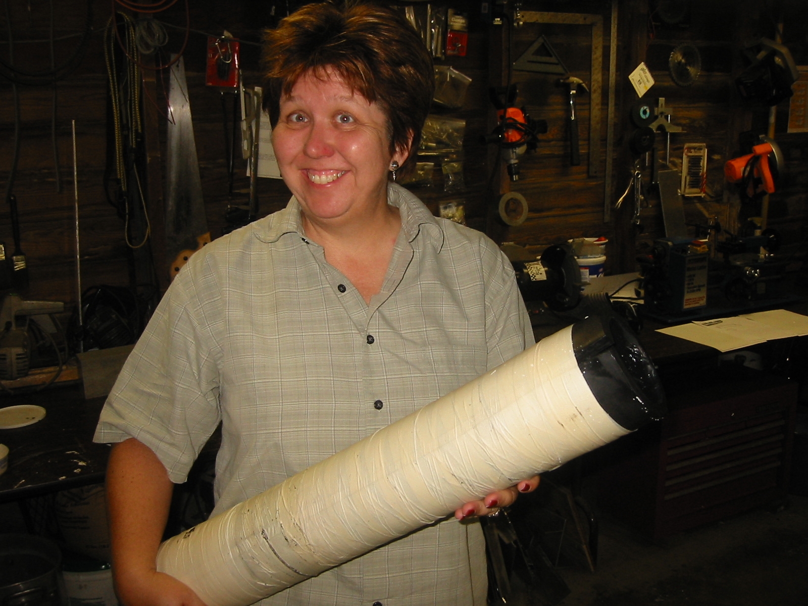 While is it still warm the machineable wax was warped around a PVC pipe and bound with tape to hold the shape while it cooled.