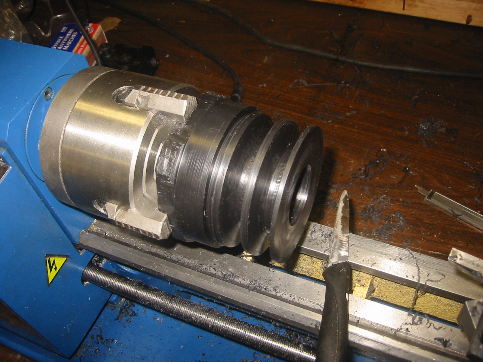 Pulley turned from machineable wax.