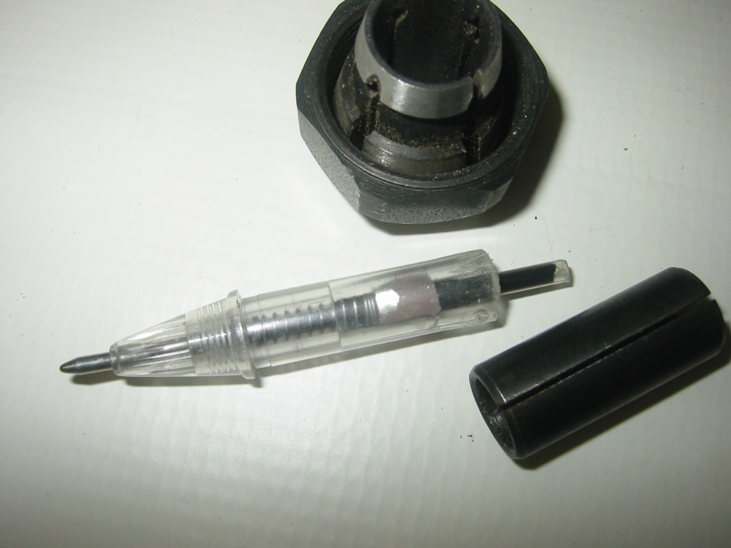 Ballpoint pen modified to fit the CNC for drawing.