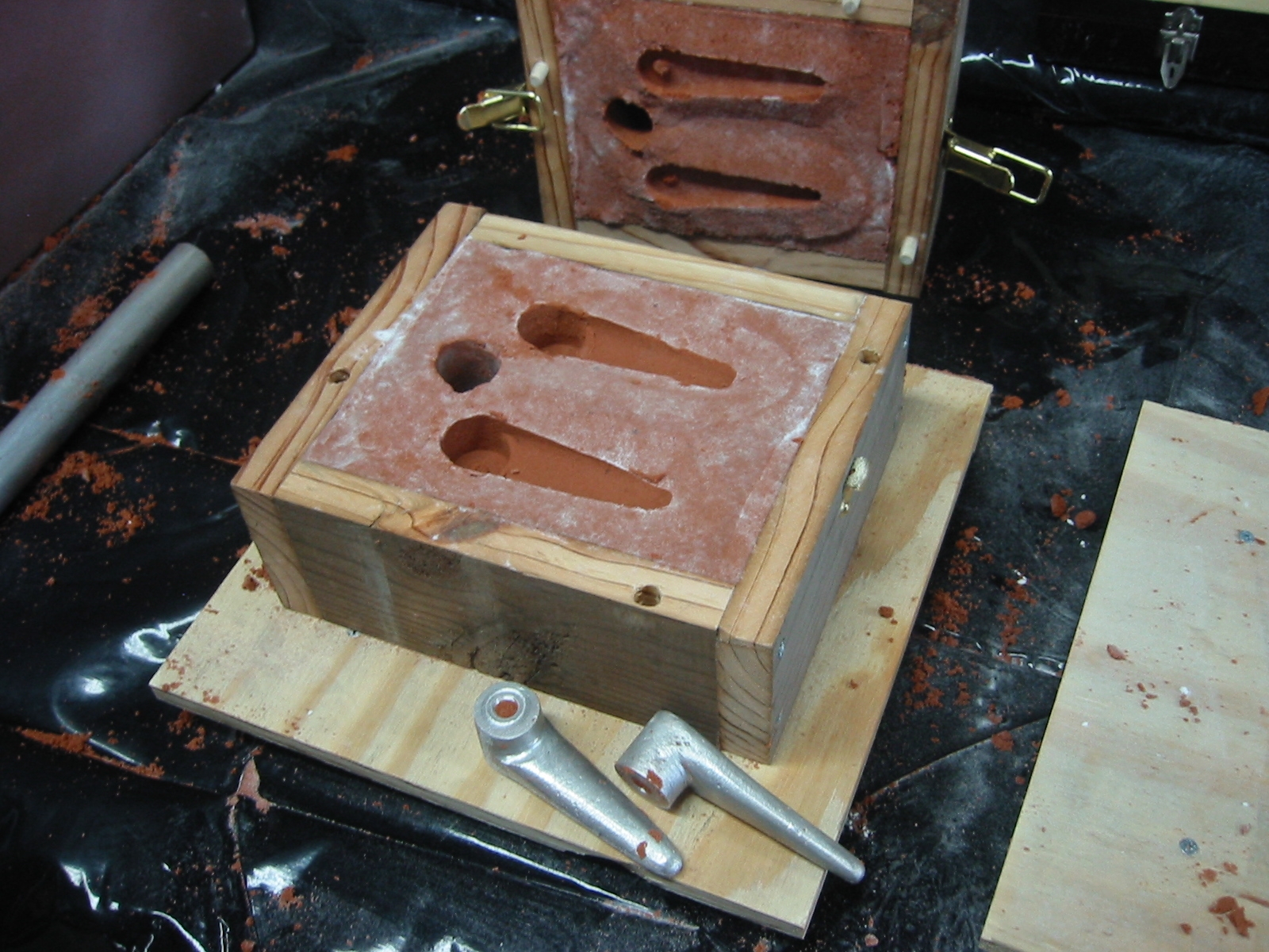 (12) Using a couple of knife blades, delicately lift the part/s from the bottom frame or