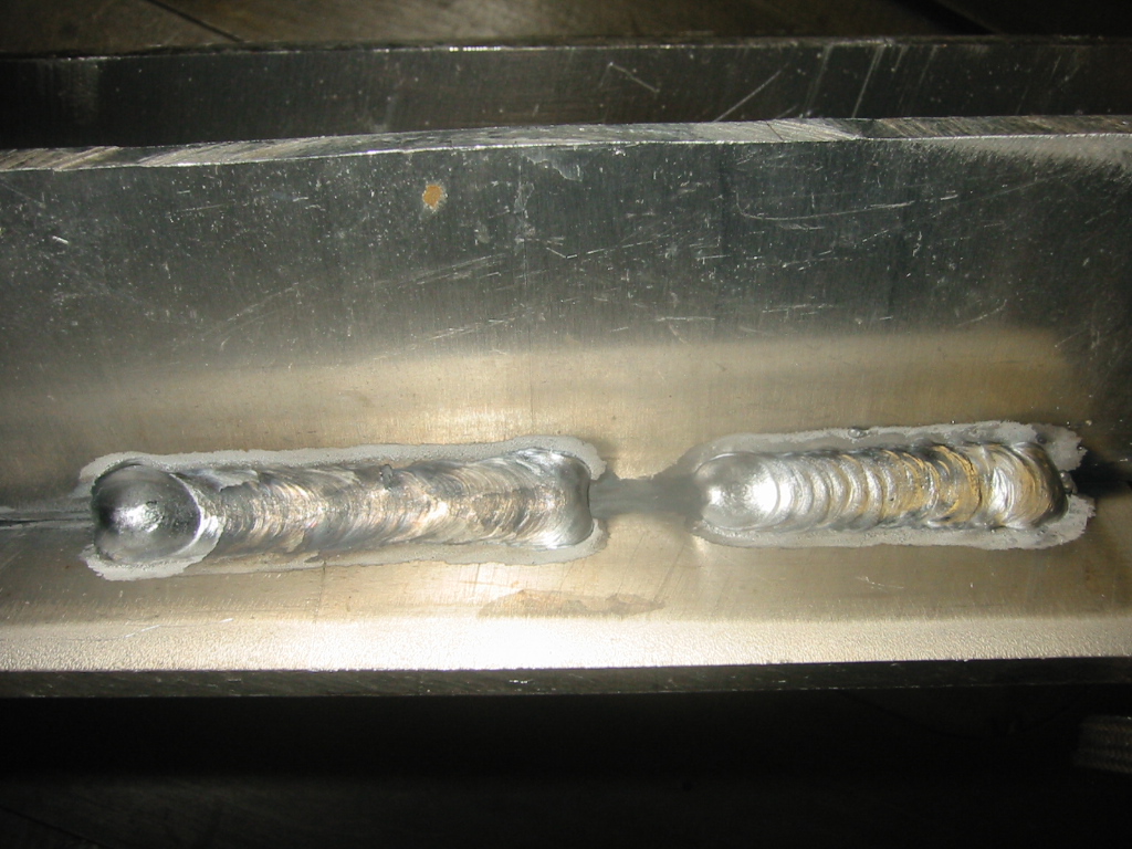 Right side is level 4, the wire speed is 300 in/min . Left side is level 6 at 370 in/min.