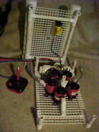 Bob fram opened up showing the bilge pumps mounted on the bottom grid.