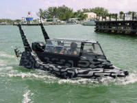 Intruder - Wet sub, powered on the surface by outboard.